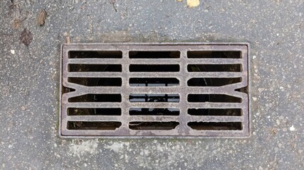 cover on the street (drainage grate)