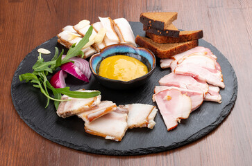 Set of pork lard various types, with garlic, onion and mustard