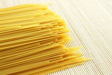 spaghetti uncooked pasta on the table, top view