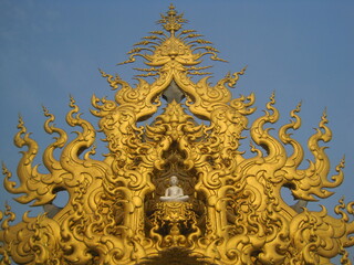 Exploring the Wat Rong Khun (White Temple) in Chiang Rai and the beaches and limestone cliffs of the Phi Phi Islands in Thailand