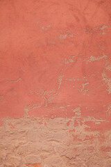 Abstract pink background texture from old weathered cement and plaster wall