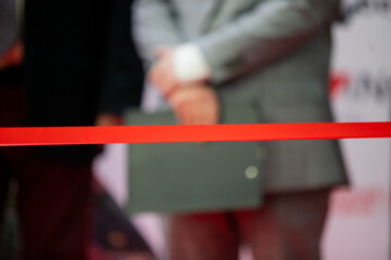 New business venture;  Opening ceremonial red ribbon