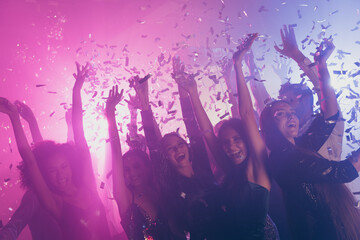 Photo of big company many carefree people girls look camera celebrate neon shiny spotlight modern club indoors