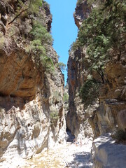 Hiking in the deep and dramatic Samaria Gorge National Park on Crete Island in Greece