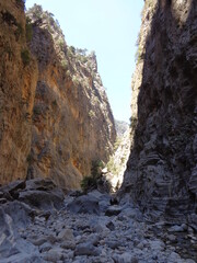 Hiking in the deep and dramatic Samaria Gorge National Park on Crete Island in Greece