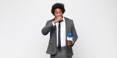 young black man as a tv presenter