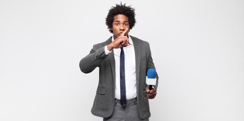 young black man as a tv presenter