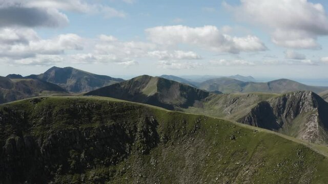 Aerial view of a green mountain ridge on the British Isles