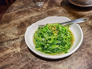 Stir-fried Thai Baby Cabbage in a thai RESTAURANT