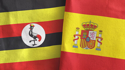 Fototapeta premium Spain and Uganda two flags textile cloth 3D rendering