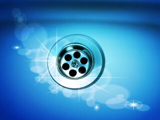 brand new stainless steel sink with prominent drainage hole and blue bokeh layer 