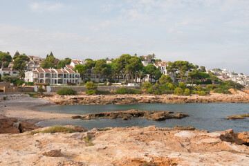 Beautiful shot of Peniscola houses on the mediterranean coast. Waterfront of the Costa del Azahar, Valencian community, Spain. Historical city. 