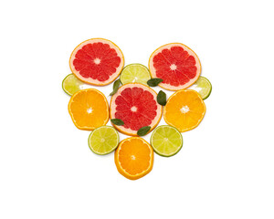 Slicing citrus fruits on a white background, in the form of a heart.