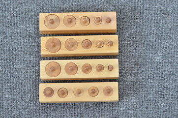Montessori Knobbed cylinders material