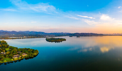 Beautiful West Lake and city skyline in Hangzhou at sunrise,China.aerial view.