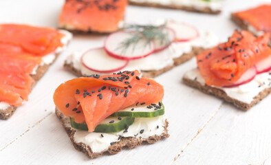 Canapes with salmon and vegetables