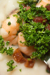 close up of shrimp with herbs
