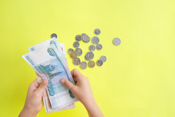 Man counting money, economy concept, money distribution