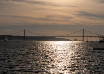 Fototapeta na wymiar Sunset with views of the Lisbon bridge