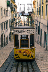 Fototapeta na wymiar Yellow tram on a street in Lisbon