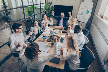 Top above high angle view photo luck lucky business people freelancers sit table boardroom...