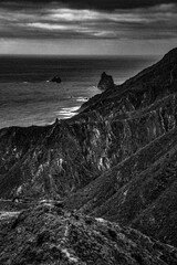 A black and white photo of the coastline in Tenerife.