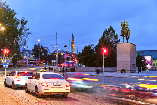 Helsinki, Finland - October 25, 2020: Mannerheimintie street in Central Helsinki. View of Equestrian statue of Marshal Mannerheim and National Museum.