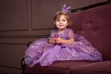  Little princess holding a magic shoe in her hands. Fairy tale. © O's angels