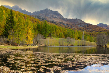 Autumn in the Alps, Italy. The Loz lake (pron. Ló). A small alpine lake located near Valtournenche (Aosta Valley), Italy.