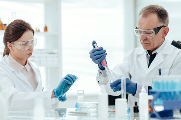 Fototapeta premium close up. scientists testing samples of a new vaccine .