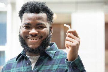 Happy smiling successful African black man  quit smoking, smoking ban concept