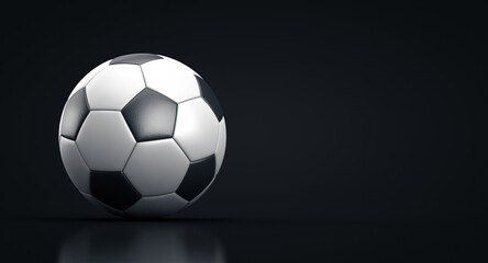 Soccer ball in a dark room. Copy space.