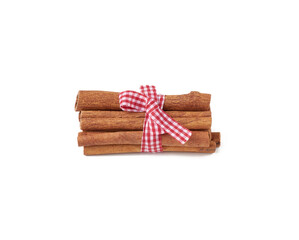 dry cinnamon sticks tied with red ribbon