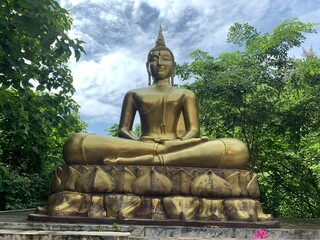 Suan phueng, Ratchaburi, Thailand : August-15-2020 : Golden Buddha Statue at Hua Khlum Monastic Residence.