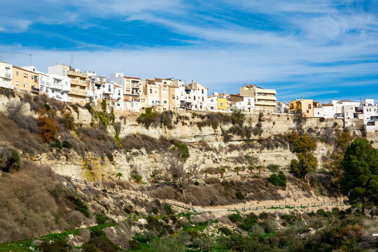 Residential buildings on the edgo of high rock in Sorbas, Spain, Almeria, Andalusia.