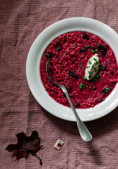 Beet root risotto with dry plums 