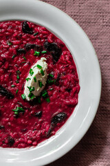 Beet root risotto with dry plums 
