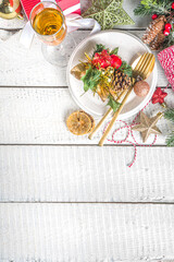Christmas or New Year table setting. Place setting for Christmas Dinner with Xmas Holiday Decorations
