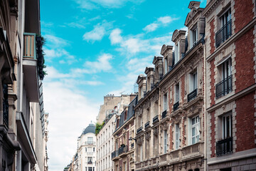 Antique building view in Paris city, France.