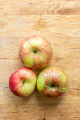 Apples on wooden background