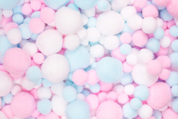 White, pink and blue soft pompons.