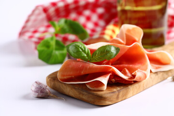 italian parma ham with basil leaf
