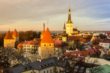 Tallinn, Estonia. Aerial view at sunset of the Old Town with the Church of St Olaf and the towers. A World Heritage Site