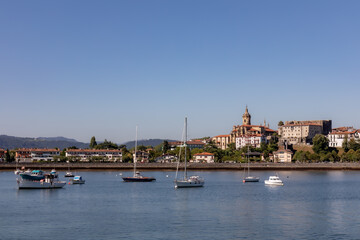 Fototapeta premium Fuentarrabia, Basque Country, Spain - View to the village from the french side of the Bidassoa river