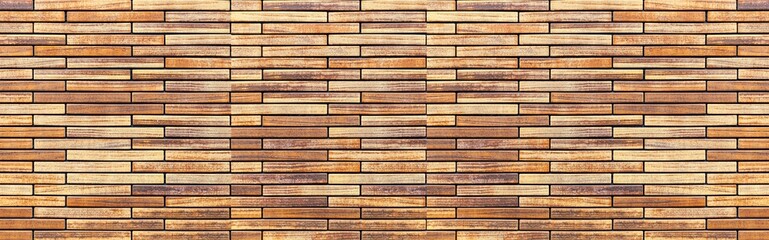 Panorama of Block pattern brown stone cladding wall tile texture and seamless background