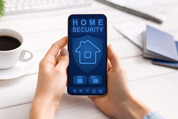 Lady using her smartphone with home security application