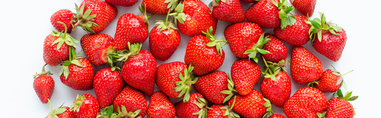 red raw fresh strawberries on white background, close view 