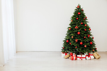 Christmas tree with gift decor for the New Year 2022 holiday winter place for inscription