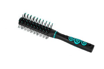 Massage plastic comb black isolate on a white background.