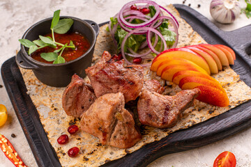 Pork kebabs, bbq meat on plate, top view.
